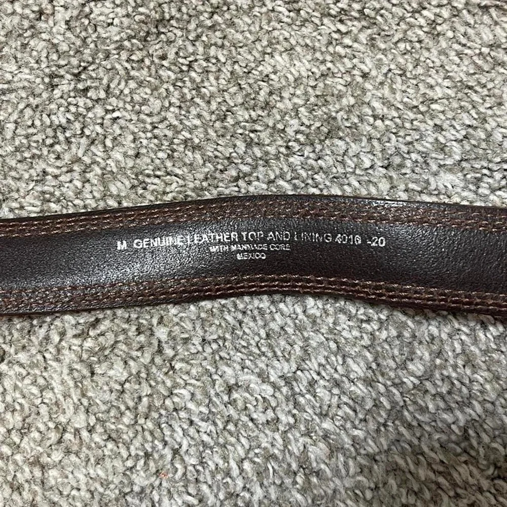 Brown suede belt with silver buckle